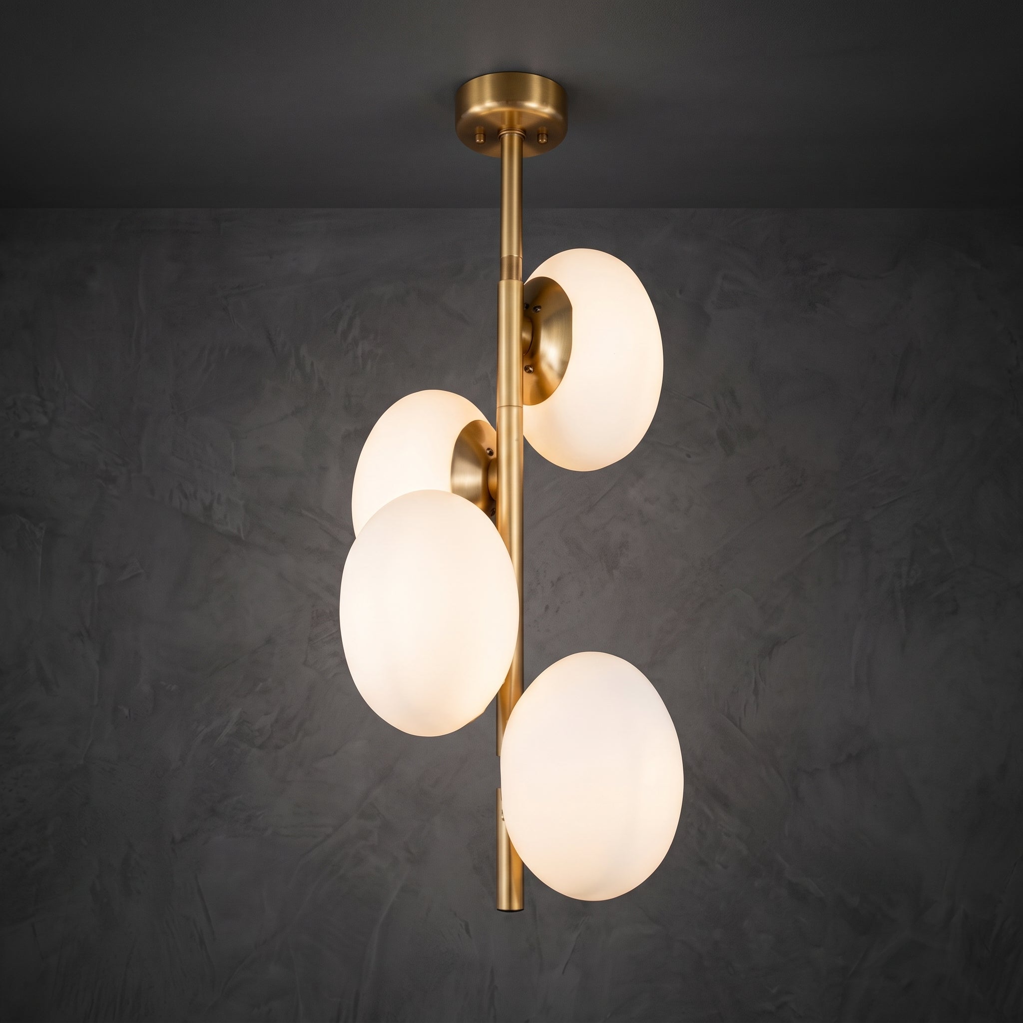 Lustre suspendu 4 globes laiton doré design moderne