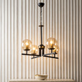 Lustre suspendu 4 globes noir et or design moderne
