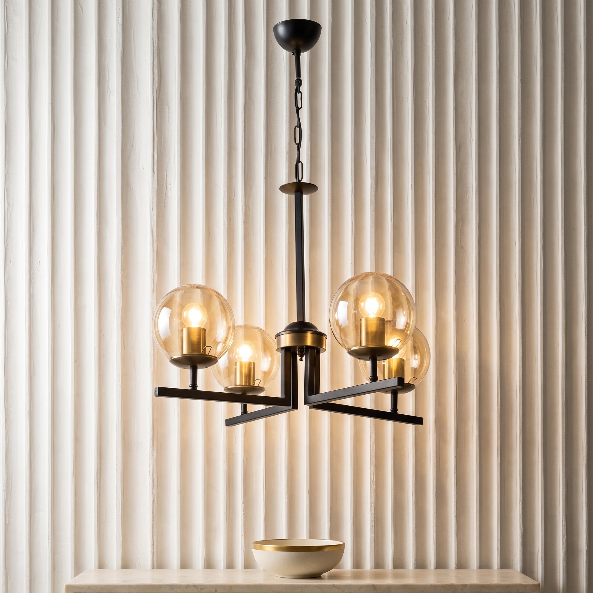 Lustre suspendu 4 globes noir et or design moderne