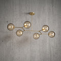 Lustre suspendu 6 globes design architectural doré et fumé