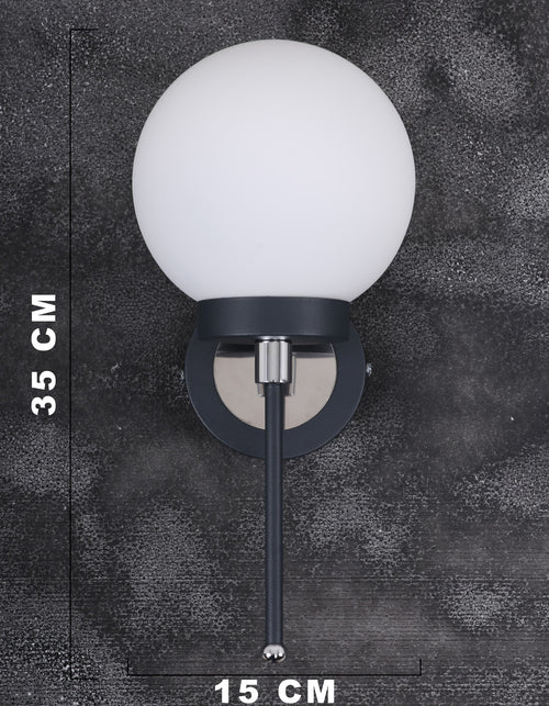 Applique globe opale blanc noir allumée diffusion lumière douce chambre