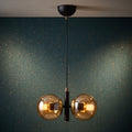 Lustre suspension double globe noir mat et doré verre ambré IP40