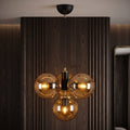 Suspension 4 globes ambré noir mat et laiton design moderne IP40