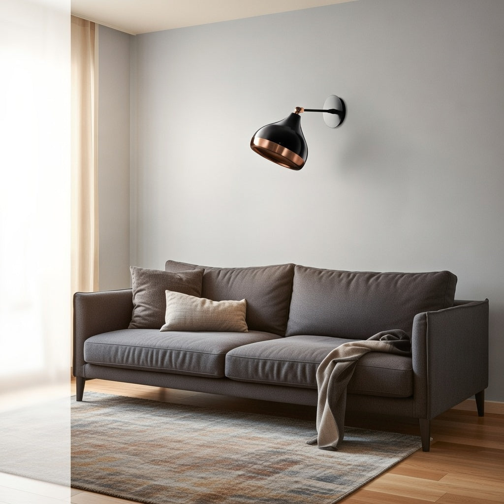 Applique noir et cuivre créant une diffusion chaleureuse