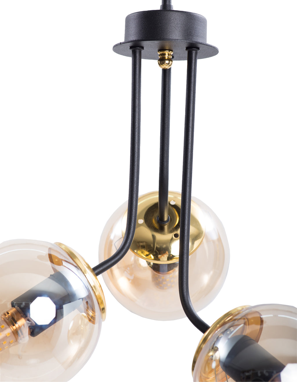 Détail des globes en verre ambré et de la structure noir mat avec détails dorés